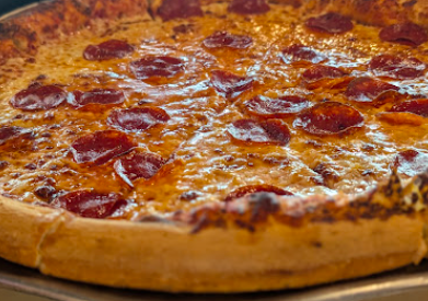 Wize Guyz Grille signature dishes Pepperoni Pizza
Extreme Fries
Bacon Cheddar Burger